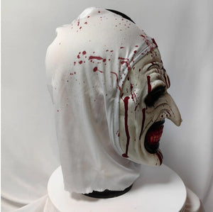Horror-themed mask with blood effects on a white background