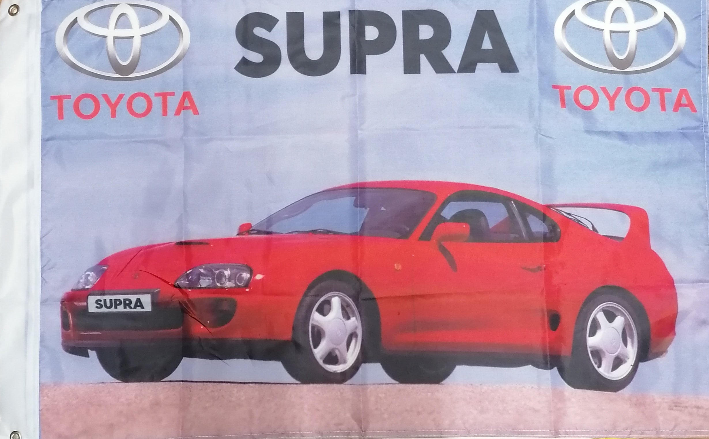 red toyota supra red