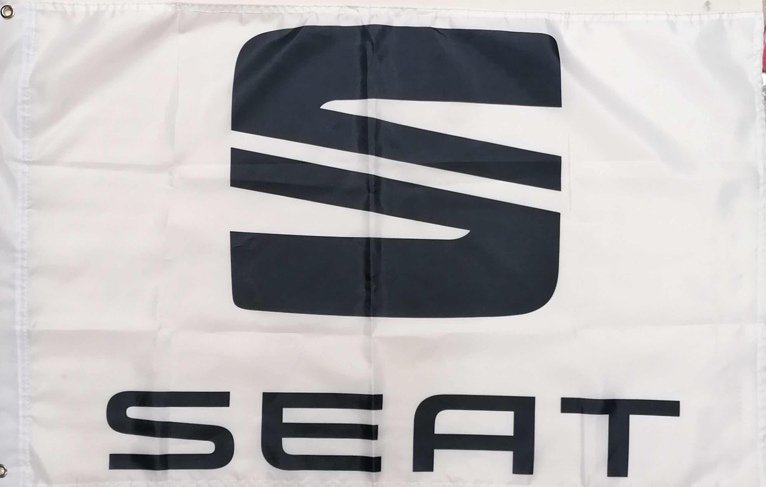 Seat car badge flag