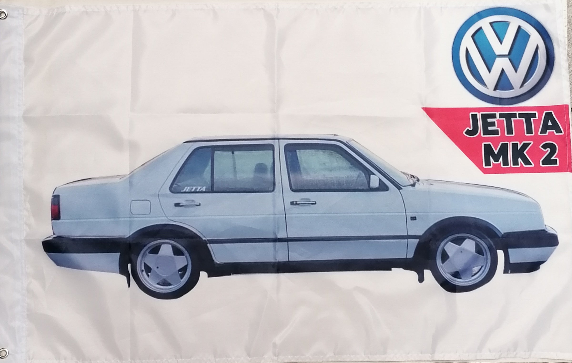 White vw jetta flag